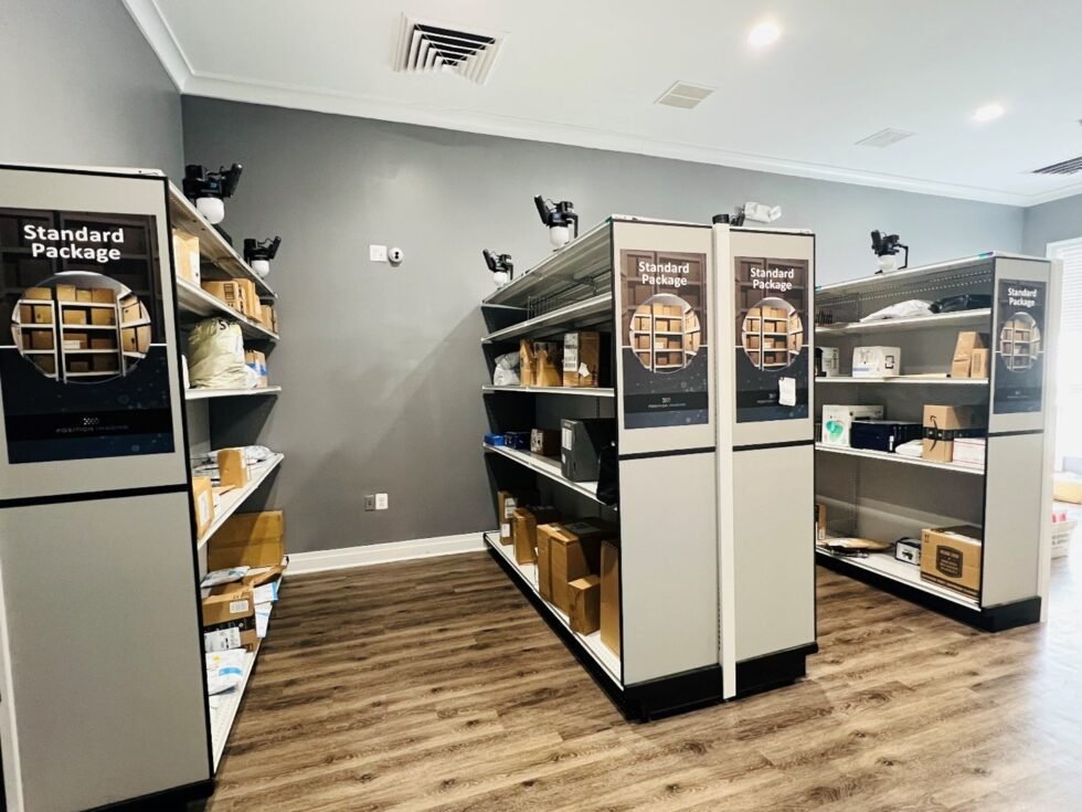 Inside a Position Imaging Smart Package Room: camera-monitored shelving units holding parcels